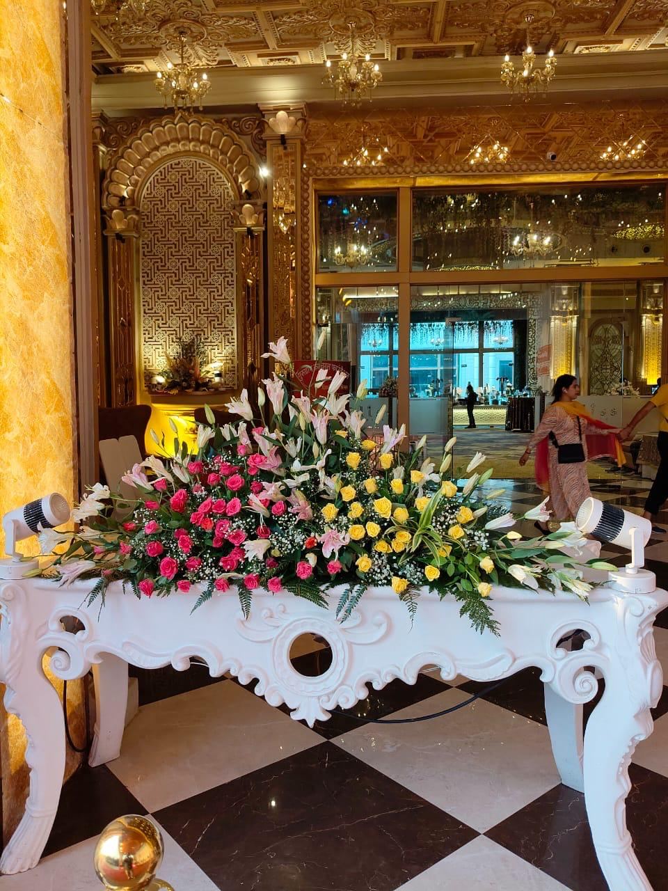 Elegant fresh flower centerpiece by Akash Flower Decoration